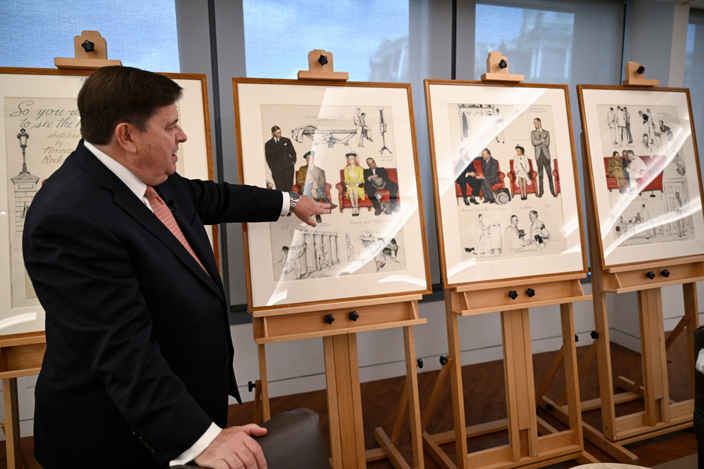 Stewart McLaurin, president of the White House Historical Association, displays a newly-acquired suite of four interrelated paintings by Norman Rockwell titled, "So You Want to See the President!" at the association's offices Wednesday, June 10, 2026, in Washington. (AP Photo/John McDonnell)