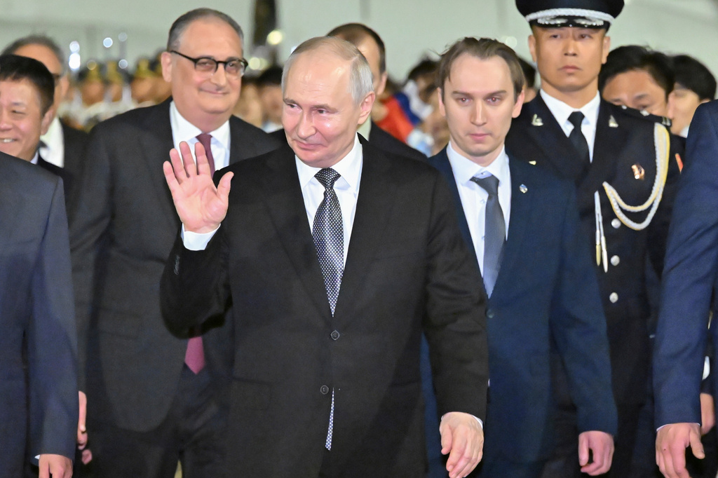 In this photo released by Xinhua News Agency, Russian President Vladimir Putin arrives for a state visit in Beijing on Tuesday, May 19, 2026. (Gao Jie/Xinhua via AP)