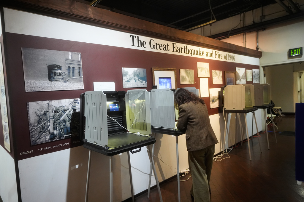 Stacey Ramirez casts her ballot for the California primary election at the Cable Car Museum on Tuesday, June 2, 2026, in San Francisco. (AP Photo/Jeff Chiu)