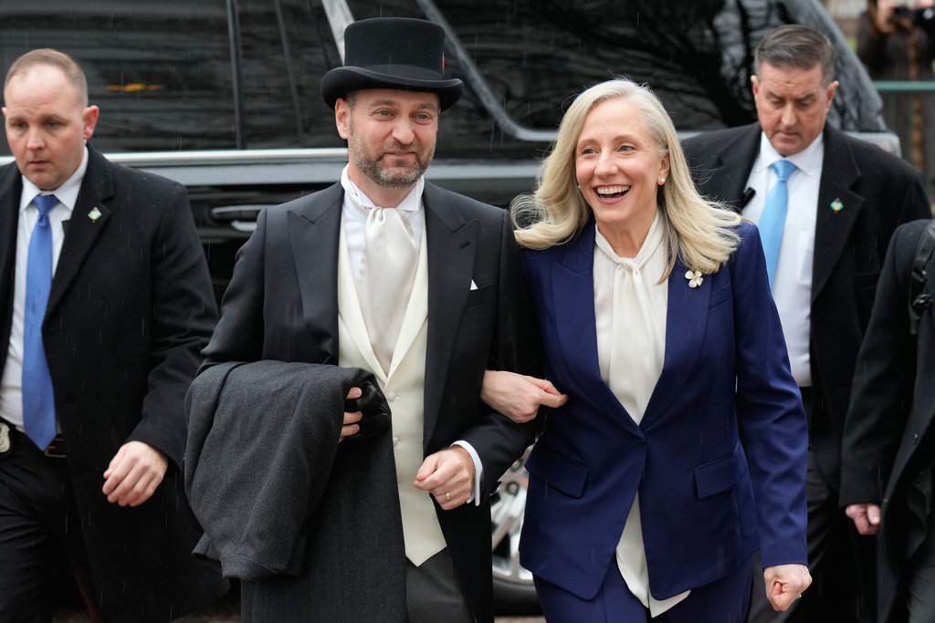 Virginia Gov. Abigail Spanberger arrives with her husband Adam Spanberger, at the Capitol in Richmond Va., Saturday Jan. 17, 2026. (AP Photo/Steve Helber, Pool)