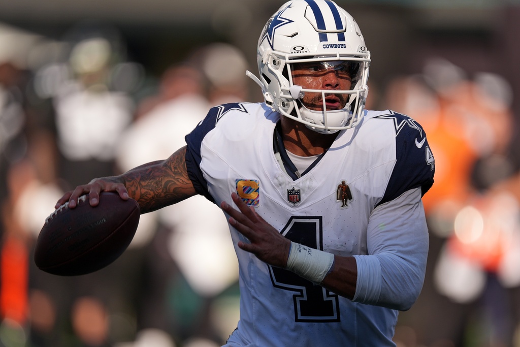 Dallas Cowboys' Dak Prescott throws during the second half of an NFL football game against the New York Jets Sunday, Oct. 5, 2025, in East Rutherford, N.J. (AP Photo/Seth Wenig)