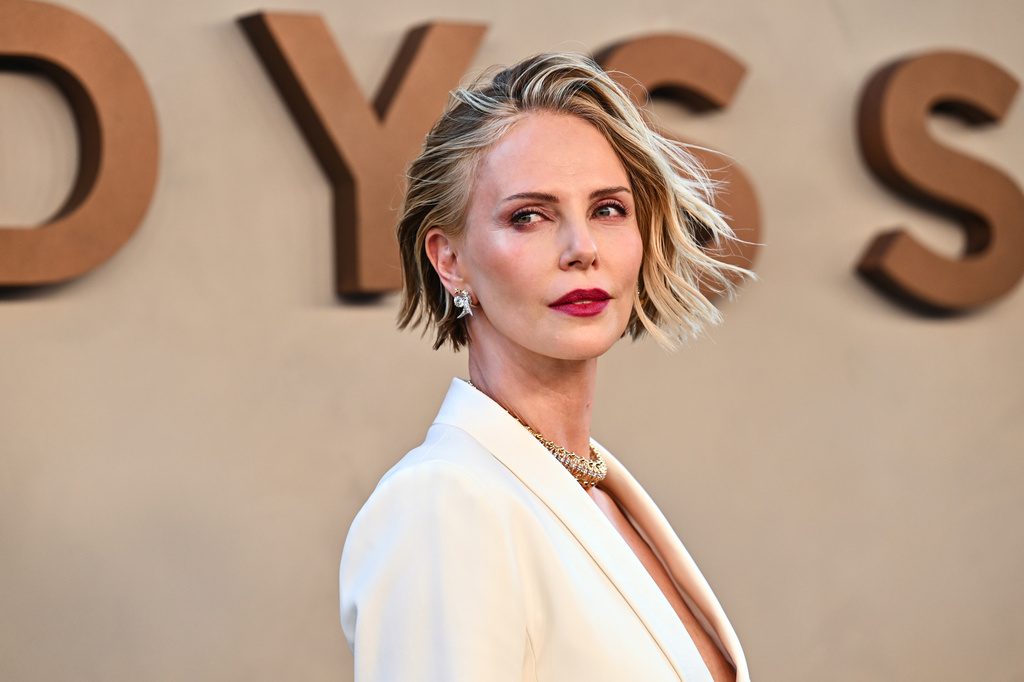 FILE - Charlize Theron attends the premiere of "The Odyssey" at AMC Lincoln Square on July 14, 2026, in New York. (Photo by Evan Agostini/Invision/AP, File)