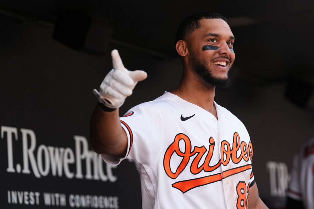 Baltimore Orioles' Jeremiah Jackson (82) celebrates with teammates after hitting a grand slam during the seventh inning in the first baseball game of a doubleheader against the Houston Astros, Thursday, April 30, 2026, in Baltimore. (AP Photo/Stephanie Scarbrough)