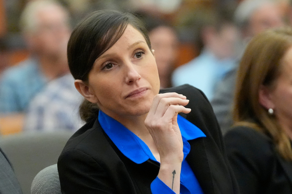 FILE - Kouri Richins, a Utah mother of three who wrote a children's book about coping with grief after her husband's death and was later accused of fatally poisoning him, looks on during a court hearing on Aug. 27, 2024, in Park City, Utah. (AP Photo/Rick Bowmer, Pool, File)