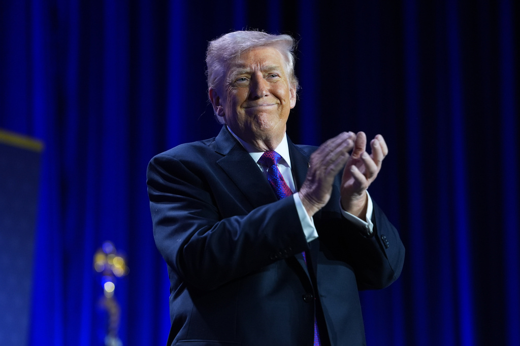 President Donald Trump applauds during the National Prayer Breakfast, Thursday, Feb. 5, 2026, in Washington. (AP Photo/Evan Vucci)