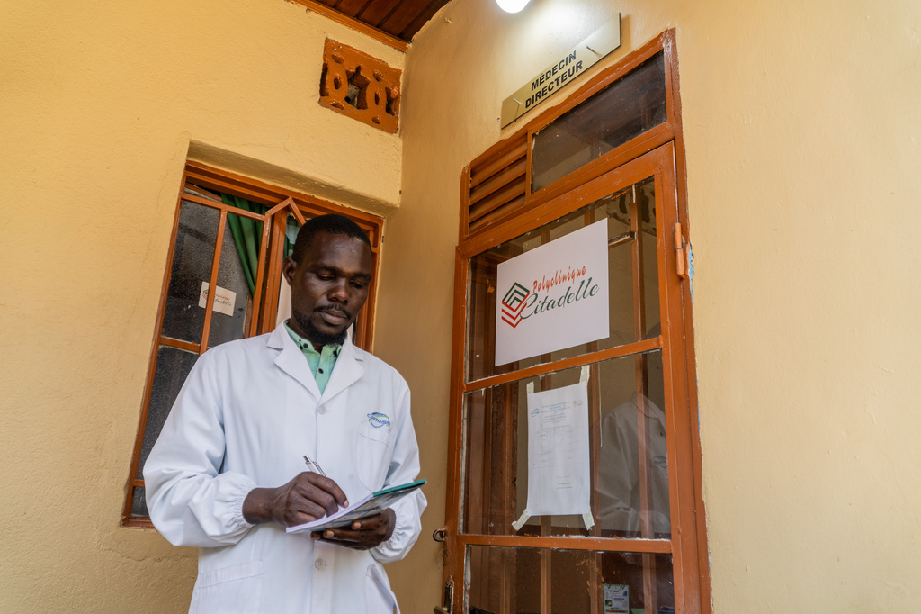 Dr Sila Jakwong'a, Medical Director of the Citadelle Clinic, stands at the entrance to his office in Bunia, Congo, Friday, June 12, 2026. (AP Photo/Moses Sawasawa)