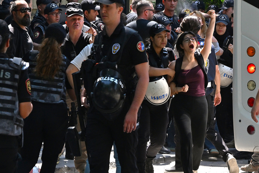 Police detain protestors during a demonstration outside of the NATO summit in Ankara, Turkey, Tuesday, July 7, 2026. (AP Photo/Ali Unal)
