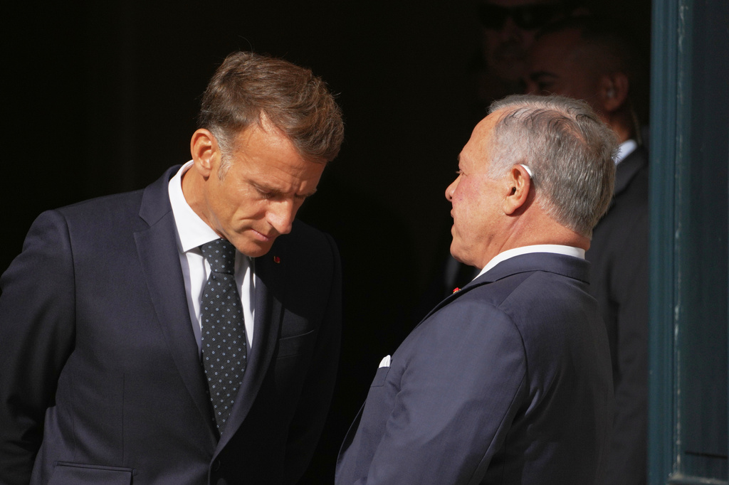 French President Emmanuel Macron, left, welcomes Jordan's King Abdullah II before a meeting at the Hotel des Invalides in Paris, Thursday Sept. 17, 2026. (AP Photo/Thibault Camus)