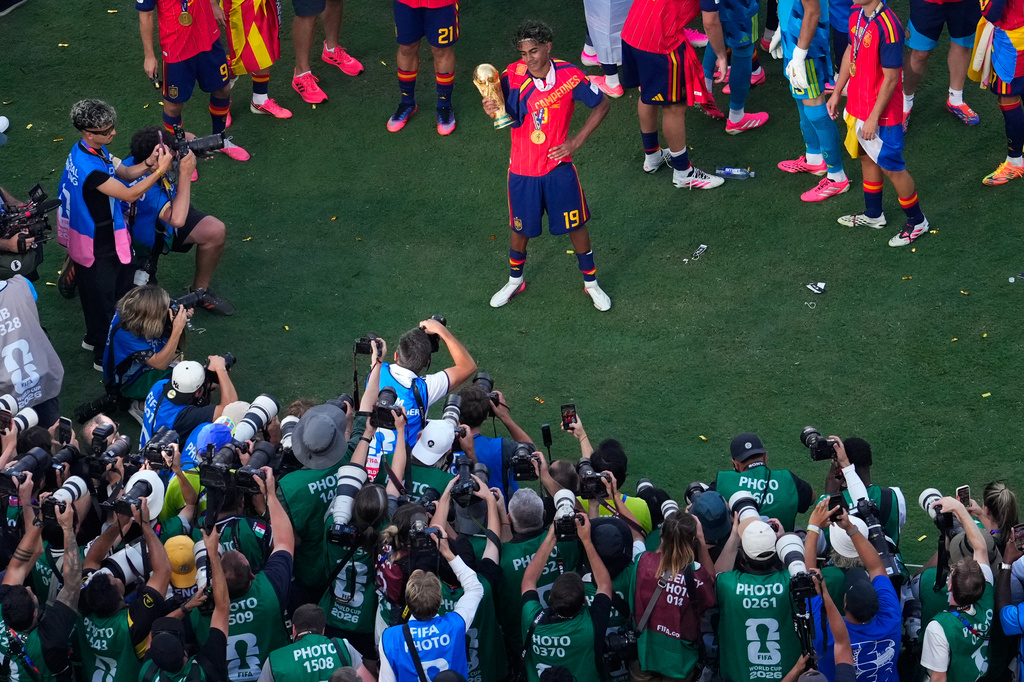 Spain's Lamine Yamal (19) poses for photographs after the World Cup final soccer match between Spain and Argentina in East Rutherford, N.J., near New York, Sunday, July 19, 2026. (AP Photo/Yuki Iwamura)