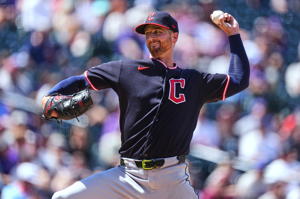 Cleveland Guardians starting pitcher Foster Griffin works against the Colorado Rockies in the second inning of a baseball game Sunday, Aug. 23, 2026, in Denver. (AP Photo/David Zalubowski)