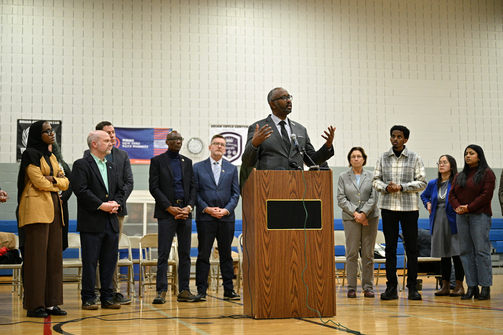 Jaylani Hussein, executive director of the Minnesota chapter of the Council on American-Islamic Relations, speaks during a press conference at Coyle Community Center in Minneapolis, Minn., as community leaders react to the immigration enforcement efforts aimed at Somalis recently announced by the Trump administration Wednesday, Dec 5, 2025. (AP Photo/Tom Baker)