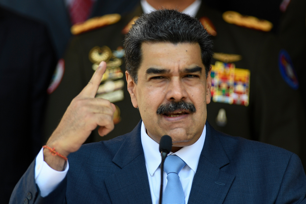 FILE - Venezuelan President Nicolas Maduro gives a press conference at the Miraflores presidential palace, March 12, 2020, in Caracas, Venezuela. (AP Photo/Matias Delacroix, File)