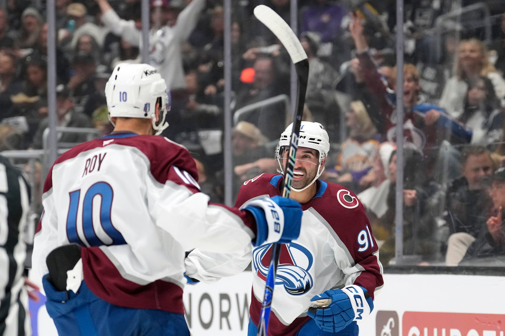 Colorado Avalanche center Nazem Kadri, right, celebrates his goal with center Nicolas Roy during the first period of Game 3 in the first round of the NHL hockey Stanley Cup playoffs against the Los Angeles Kings, Thursday, April 23, 2026, in Los Angeles. (AP Photo/Mark J. Terrill)