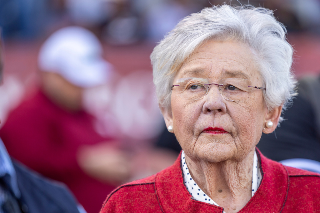 FILE - Alabama Gov. Kay Ivey visits the sidelines during an NCAA football game between Troy and Arkansas State, Oct. 7, 2023, in Troy, Ala. (AP Photo/Vasha Hunt, File)