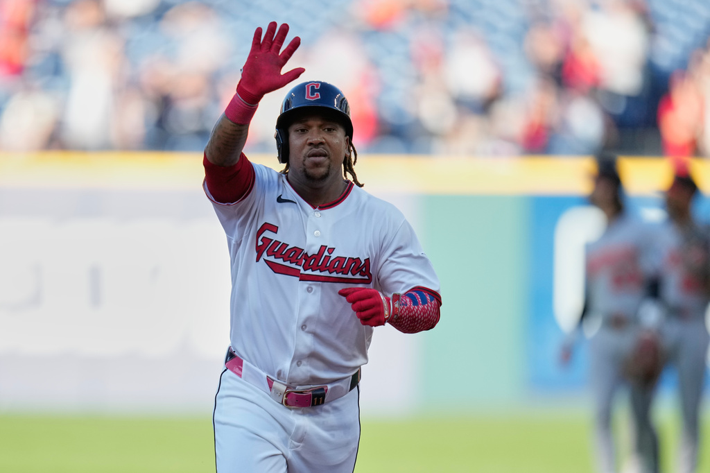 Cleveland Guardians' José Ramírez gestrures as he runs the bases after hitting a home run in the first inning of a baseball game against the Baltimore Orioles in Cleveland, Thursday, April 16, 2026. (AP Photo/Sue Ogrocki)