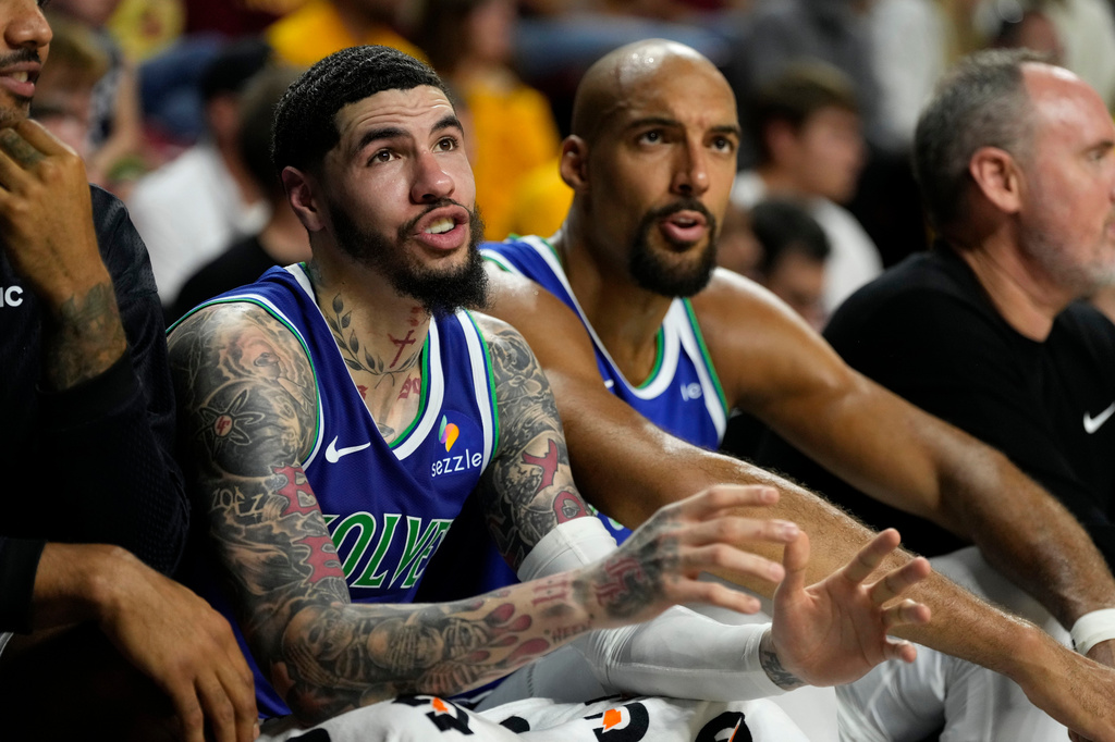 Minnesota Timberwolves guard LaMelo Ball talks with an official during the first half of a preseason NBA basketball game against the Indiana Pacers, Wednesday, Oct. 7, 2026, in Ames, Iowa. (AP Photo/Charlie Neibergall)
