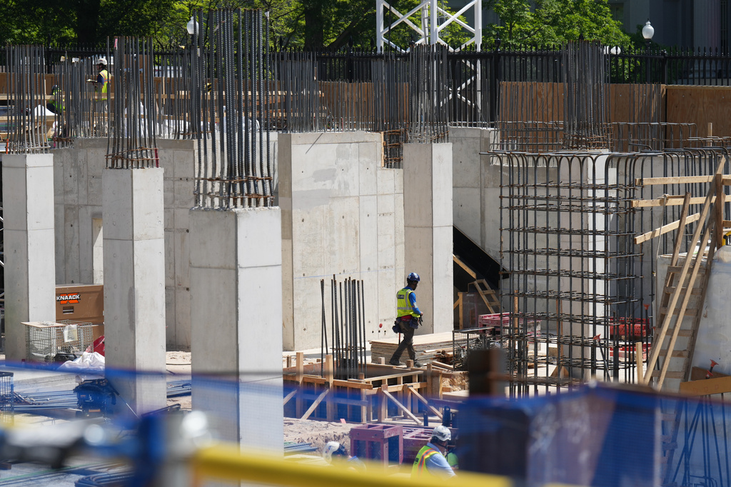 The Ballroom construction site can be seen as President Donald Trump tours the area at the White House, Tuesday, May 19, 2026, in Washington. (AP Photo/Jacquelyn Martin)