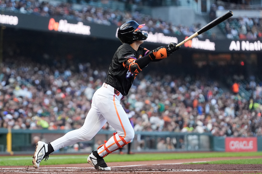San Francisco Giants' Jung Hoo Lee watches his home run against the Athletics during the second inning of a baseball game Tuesday, June 23, 2026, in San Francisco. (AP Photo/Jeff Chiu)