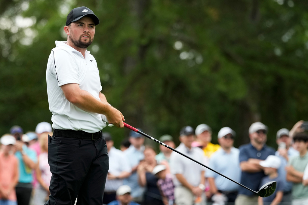 Alex Fitzpatrick, of England, hits from the third tee during third round of the Truist Championship golf tournament at the Quail Hollow Club, Saturday, May 9, 2026, in Charlotte, N.C. (AP Photo/Chris Carlson)