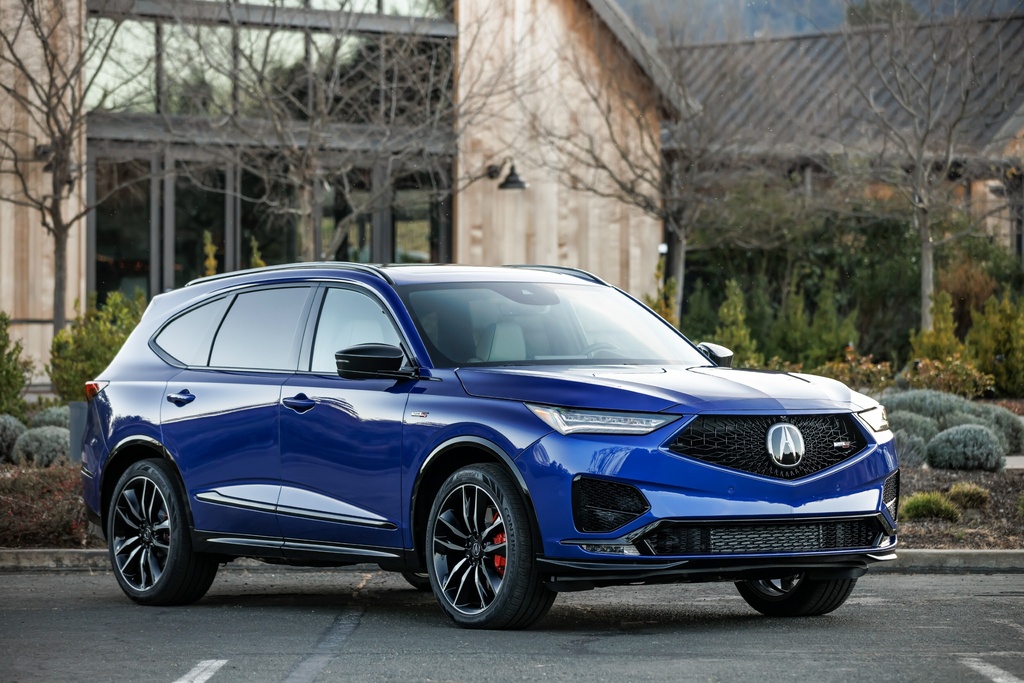 This photo provided by Acura shows the 2022 MDX. The three-row MDX's cabin has a high-quality look and feel, and every MDX comes with a full complement of standard advanced driving aids. (Courtesy of American Honda Motor Co. via AP)