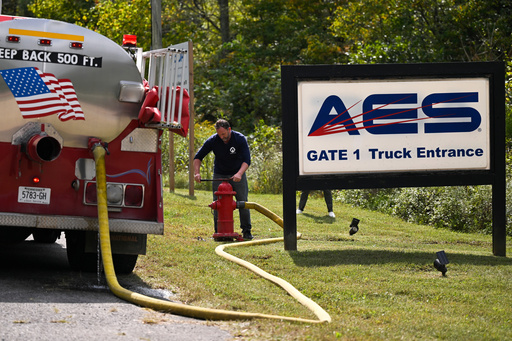 A person attaches a hose to a fire hydrant to fill a tanker truck after a blast resulted in multiple fatalities and others missing at Accurate Energetic Systems, an explosives plant, Friday, Oct. 10, 2025, in Bucksnort, Tenn. (AP Photo/John Amis) A person attaches a hose to a fire hydrant to fill a tanker truck after a blast resulted in multiple fatalities and others missing at Accurate Energetic Systems, an explosives plant, Friday, Oct. 10, 2025, in Bucksnort, Tenn. (AP Photo/John Amis)