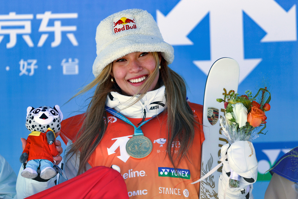 FILE - In this photo released by Xinhua News Agency, Gold medalist Eileen Gu Ailing of China poses during the awards ceremony for the women's halfpipe finals at FIS Freeski World Cup 2025 in Zhangjiakou, north China's Hebei Province, Saturday, Dec. 7, 2024. (Luo Yuan/Xinhua via AP, File)