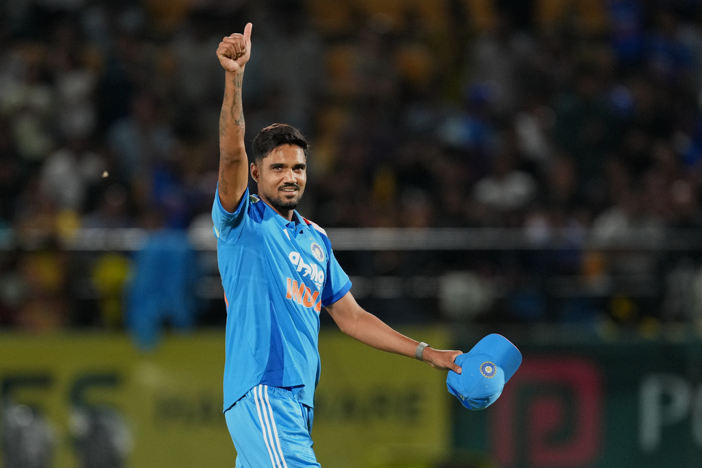 India's Gurnoor Brar acknowledges the applause from fans after taking three wickets during the first ODI cricket match between Afghanistan and India in Dharamshala, India, Saturday, June 13, 2026. (AP Photo/Ashwini Bhatia)