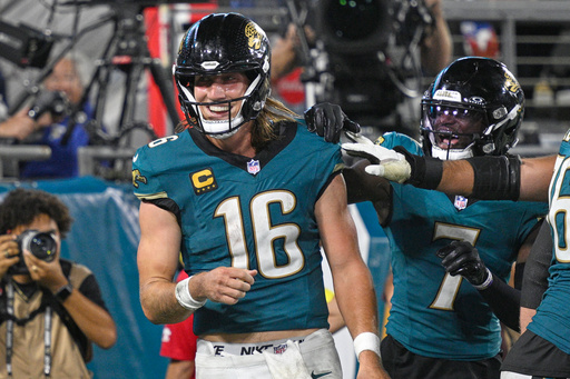 Jacksonville Jaguars quarterback Trevor Lawrence (16) celebrates with teammates after scoring a touchdown during the second half of an NFL football game against the Kansas City Chiefs, Monday, Oct. 6, 2025, in Jacksonville, Fla. (AP Photo/Phelan M. Ebenhack) Jacksonville Jaguars quarterback Trevor Lawrence (16) celebrates with teammates after scoring a touchdown during the second half of an NFL football game against the Kansas City Chiefs, Monday, Oct. 6, 2025, in Jacksonville, Fla. (AP Photo/Phelan M. Ebenhack)