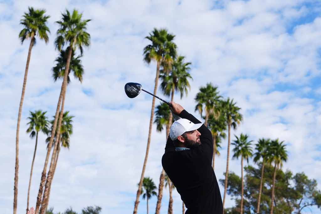Scottie Scheffler hits from the second tee during the first round of the American Express golf event at La Quinta Country Club Thursday, Jan. 22, 2026, in La Quinta, Calif. (AP Photo/Ross D. Franklin)