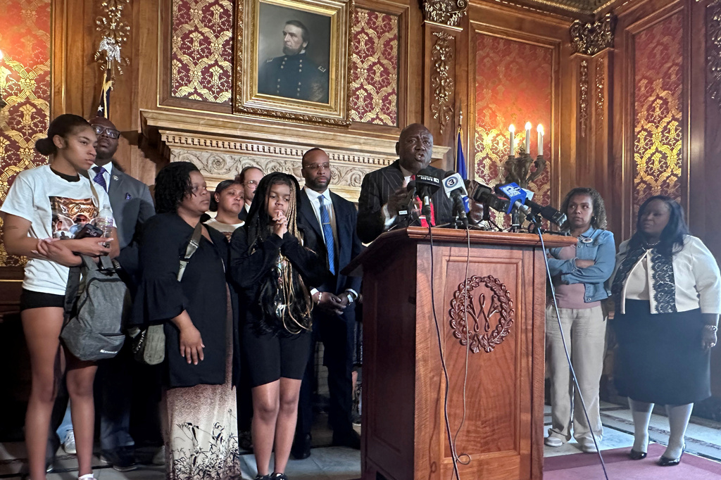 Attorney Ben Crump speaks alongside family members of Corey Ruiz, who was shot and killed by police, Friday, July 24, 2026, in Madison, Wis. (AP Photo/Scott Bauer)