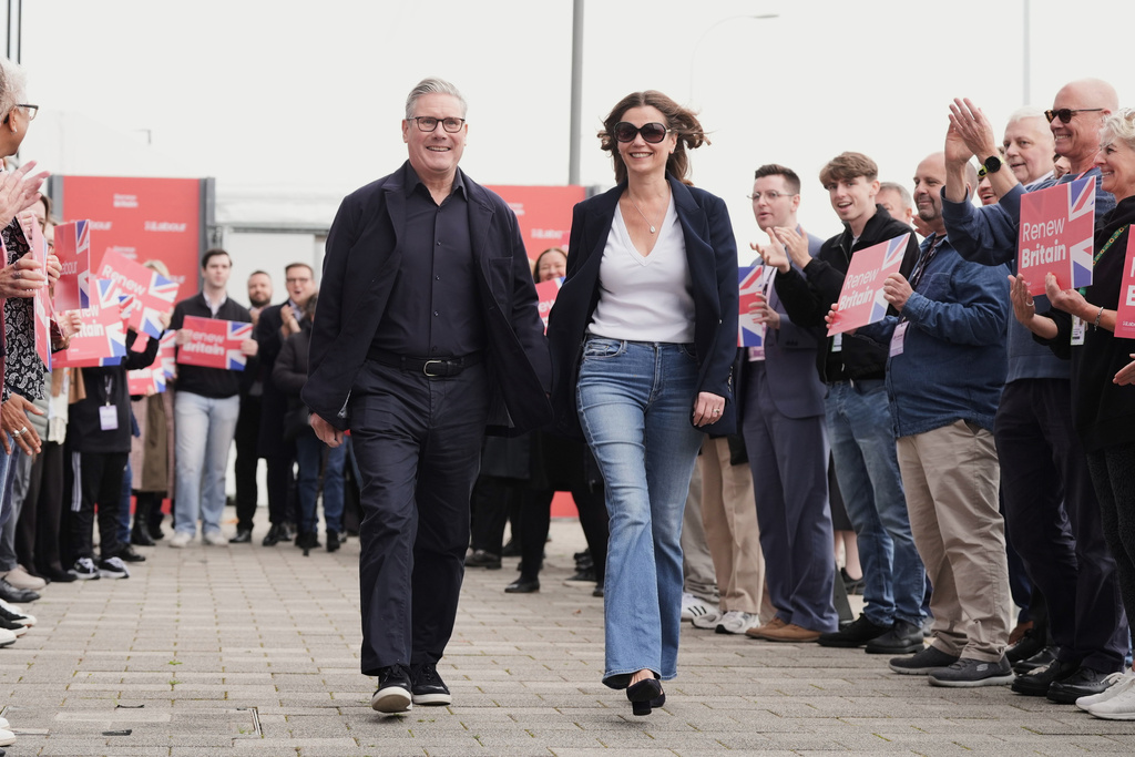 Britain's Prime Minister Keir Starmer and his wife Victoria arrive ahead of the Labour Party Conference at the ACC Liverpool, in Liverpool, England, Saturday, Sept. 27, 2025. (Stefan Rousseau/PA via AP)