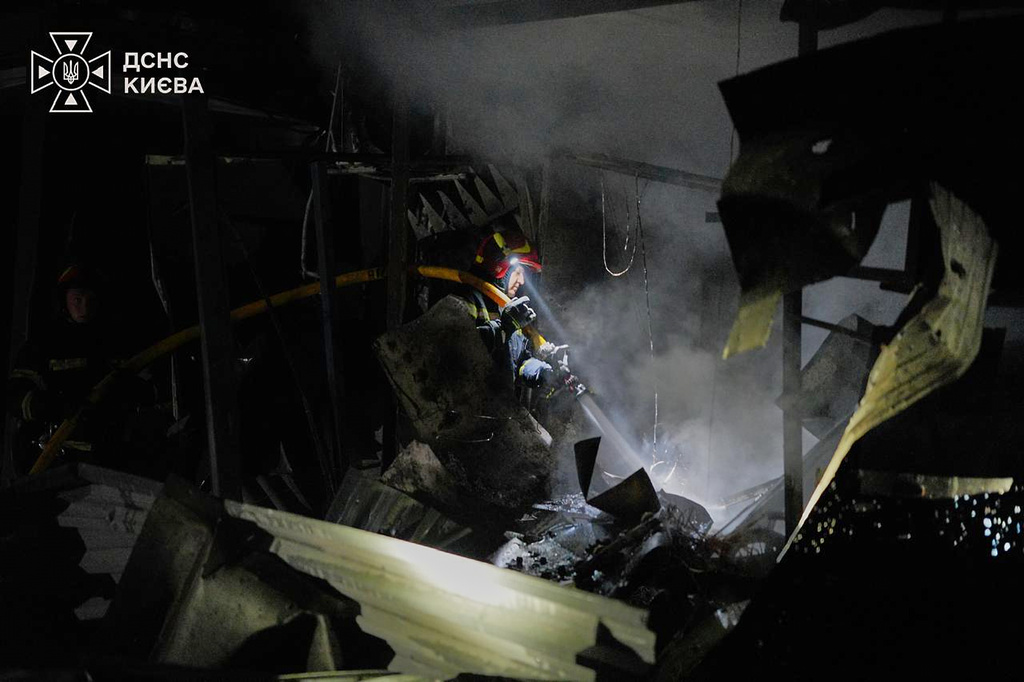 In this photo provided by the Ukrainian Emergency Service, firefighters put out a fire following a Russian missile attack in Kyiv, Ukraine, Tuesday, Sept. 1, 2026. (Ukrainian Emergency Service via AP)