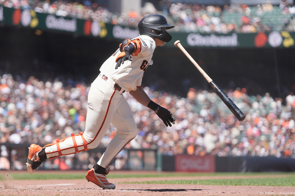 San Francisco Giants' Jung Hoo Lee watches his two-run double during the sixth inning of a baseball game against the Milwaukee Brewers, Wednesday, July 29, 2026, in San Francisco. (AP Photo/Jeff Chiu)
