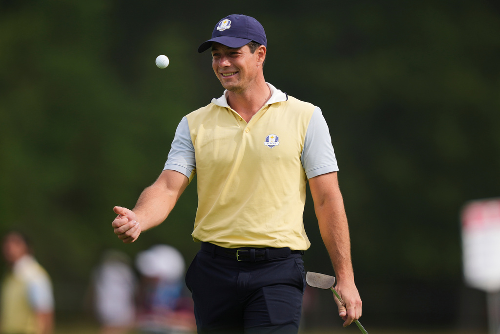 Europe's Viktor Hovland tosses his ballon the 12th hole during a practice round for the Ryder Cup golf tournament, Wednesday, Sept. 24, 2025, on the Bethpage Black golf course, in Farmingdale, N.Y. (AP Photo/Matt Slocum)