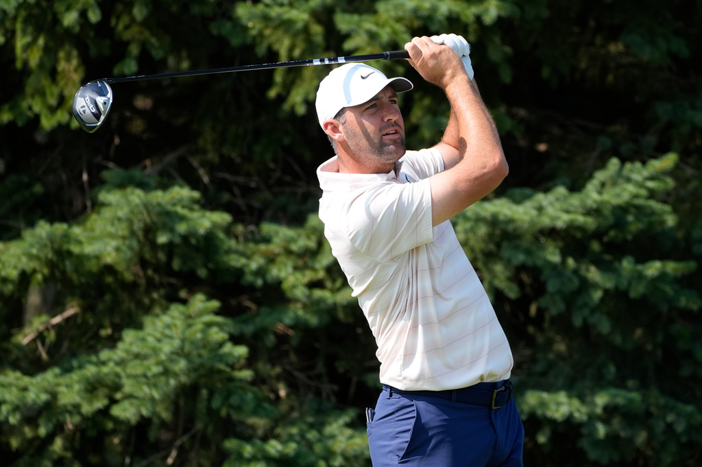 Scottie Scheffler hits from the second tee during the first round of the 3M Open golf tournament at the Tournament Players Club Thursday, July 23, 2026, in Blaine, Minn. (AP Photo/Bruce Kluckhohn)