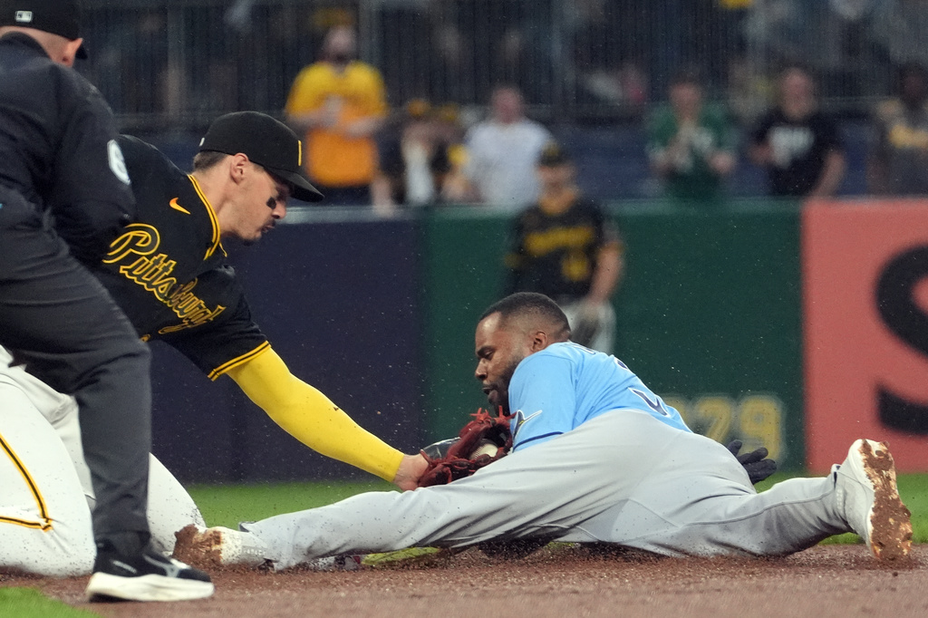 Pittsburgh Pirates shortstop Konnor Griffin tags out Tampa Bay Rays' Cedric Mullins attempting to steal second base to end the fifth inning of a baseball game in Pittsburgh, Saturday, April 18, 2026. (AP Photo/Tom E. Puskar)