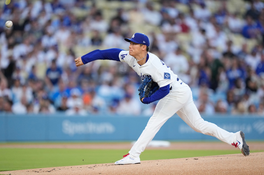 Los Angeles Dodgers starting pitcher Yoshinobu Yamamoto throws to the plate during the first inning of a baseball game against the Pittsburgh Pirates, Friday, Aug. 21, 2026, in Los Angeles. (AP Photo/Mark J. Terrill)