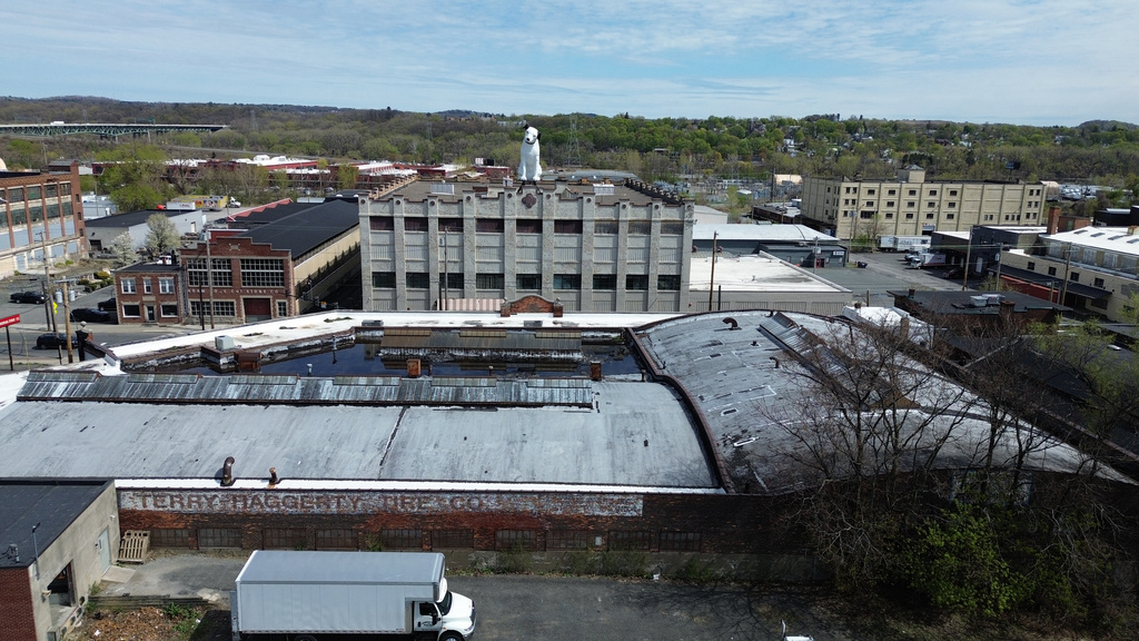 A giant statue of Nipper the dog sits atop a building in the warehouse district in Albany, N.Y., Tuesday, April 21, 2026. (AP Photo/Ted Shaffrey)