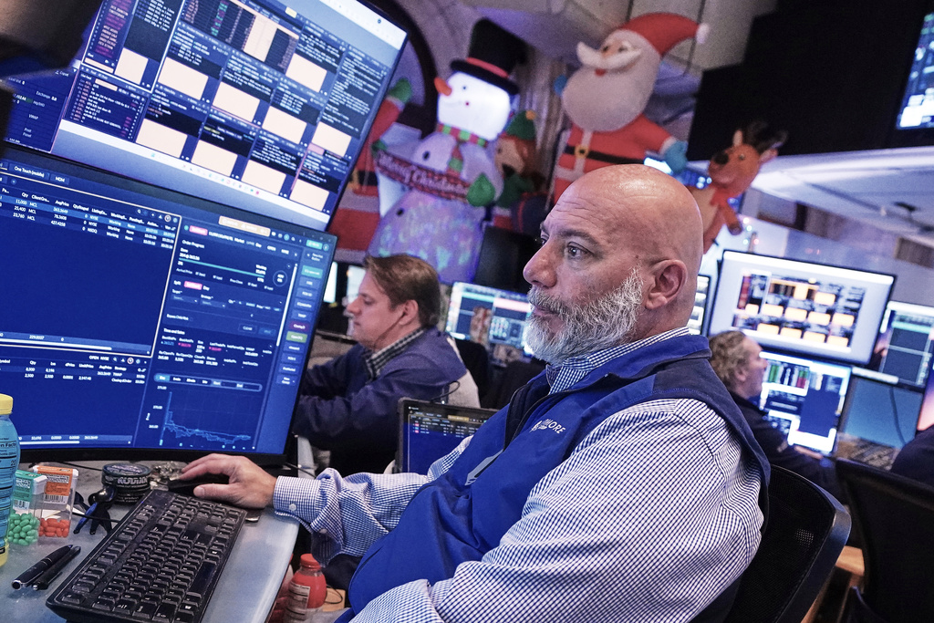 Trader Vincent Napolitano works on the floor of the New York Stock Exchange, Tuesday, Dec. 2, 2025. (AP Photo/Richard Drew)