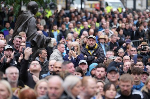 Crowds gather outside Manchester Cathedral during the funeral for boxer Ricky Hatton in Manchester, England, Friday, Oct. 10, 2025. (AP Photo/Jon Super) Crowds gather outside Manchester Cathedral during the funeral for boxer Ricky Hatton in Manchester, England, Friday, Oct. 10, 2025. (AP Photo/Jon Super)
