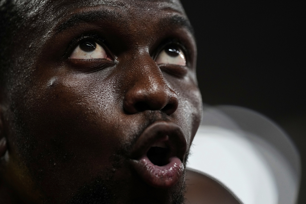 Jamaica's Demario Prince reacts after a men's 110 meters hurdles semifinal at the World Athletics Championships in Tokyo, Tuesday, Sept. 16, 2025. (AP Photo/Petr David Josek)