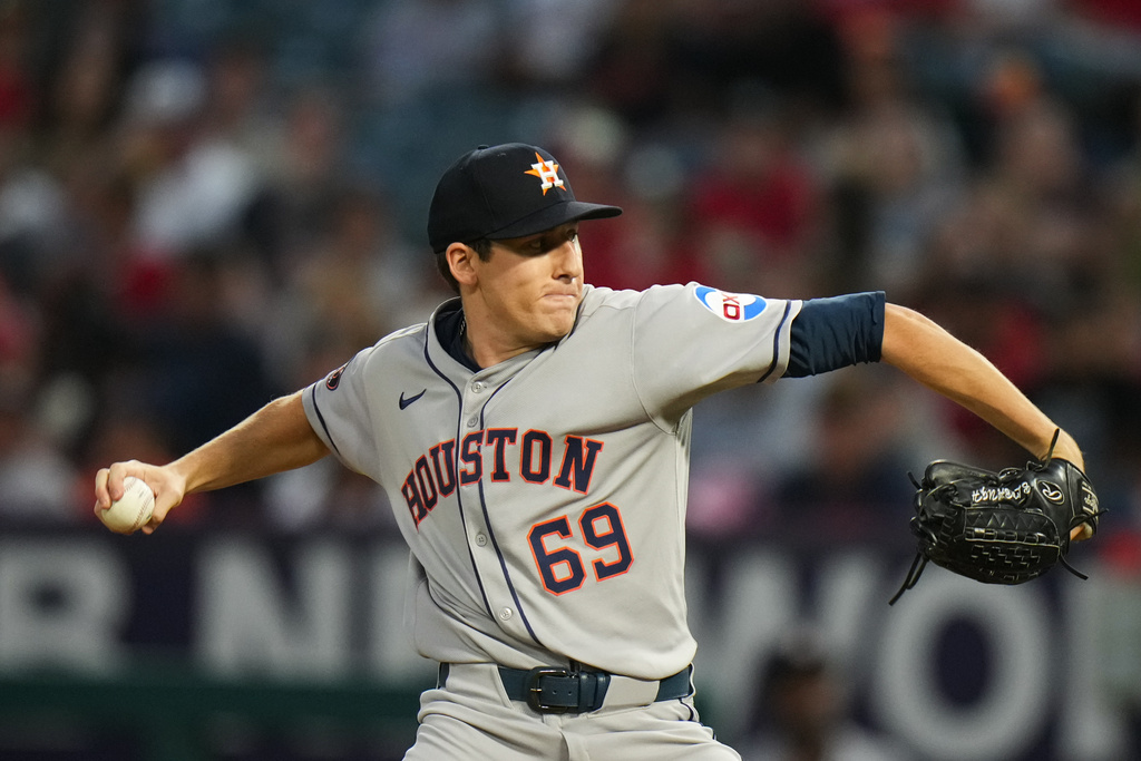 Houston Astros starting pitcher AJ Blubaugh throws against the Los Angeles Angels during the first inning of a baseball game Saturday, Sept. 27, 2025, in Anaheim, Calif. (AP Photo/Jae C. Hong)