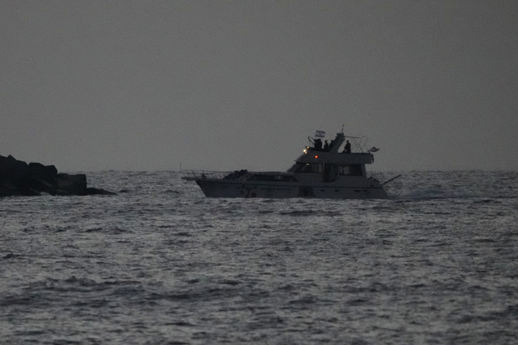 Israeli naval forces sail a confiscated Gaza-bound flotilla boat into Israel's Ashdod port after intercepting the vessel on the Mediterranean Sea, Tuesday, May 19, 2026. (AP Photo/Ariel Schalit)