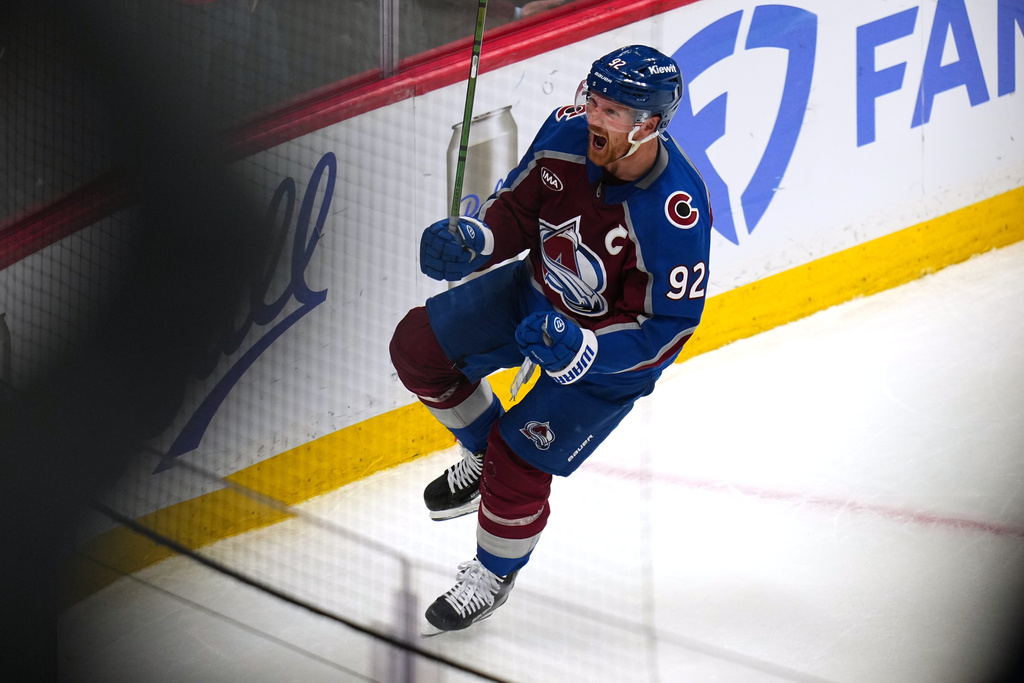 Colorado Avalanche left wing Gabriel Landeskog celebrates a goal against the Los Angeles Kings during the third period of Game 2 in the first round of the NHL hockey Stanley Cup playoffs, Tuesday, April 21, 2026, in Denver. (AP Photo/Jack Dempsey)