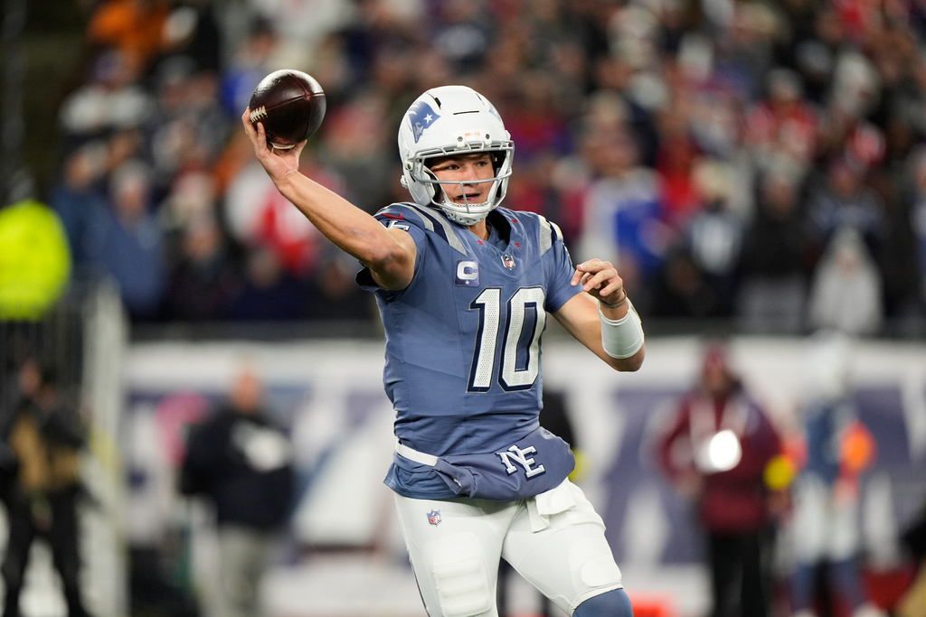New England Patriots quarterback Drake Maye passes the ball during the first half of an NFL football game against the New York Jets, Thursday, Nov. 13, 2025, in Foxborough, Mass. (AP Photo/Robert F. Bukaty)