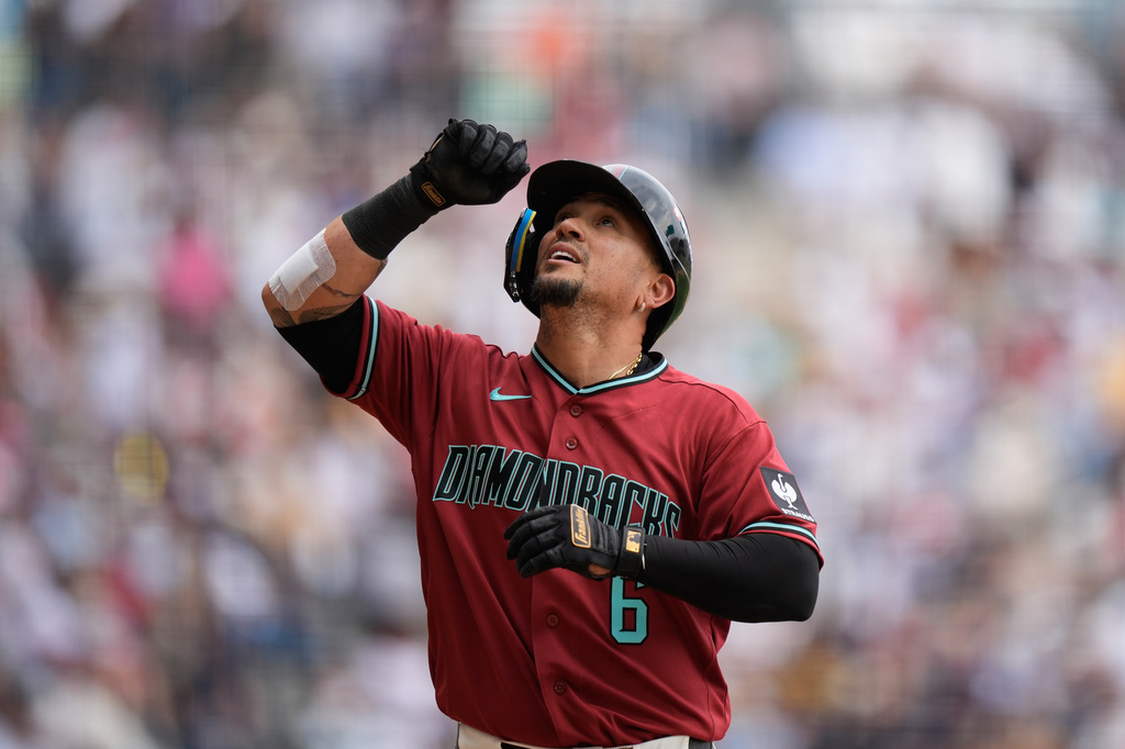 Arizona Diamondbacks' Ildemaro Vargas celebrates after hitting a home run against the San Diego Padres during the sixth inning of a baseball game in Mexico City, Sunday, April 26, 2026. (AP Photo/Fernando Llano)