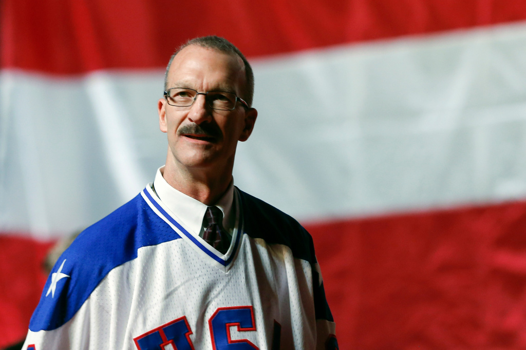 FILE - Ken Morrow of the 1980 U.S. ice hockey team walks on stage during a "Relive the Miracle" reunion at Herb Brooks Arena on Feb. 21, 2015, in Lake Placid, N.Y. (AP Photo/Mike Groll, File)
