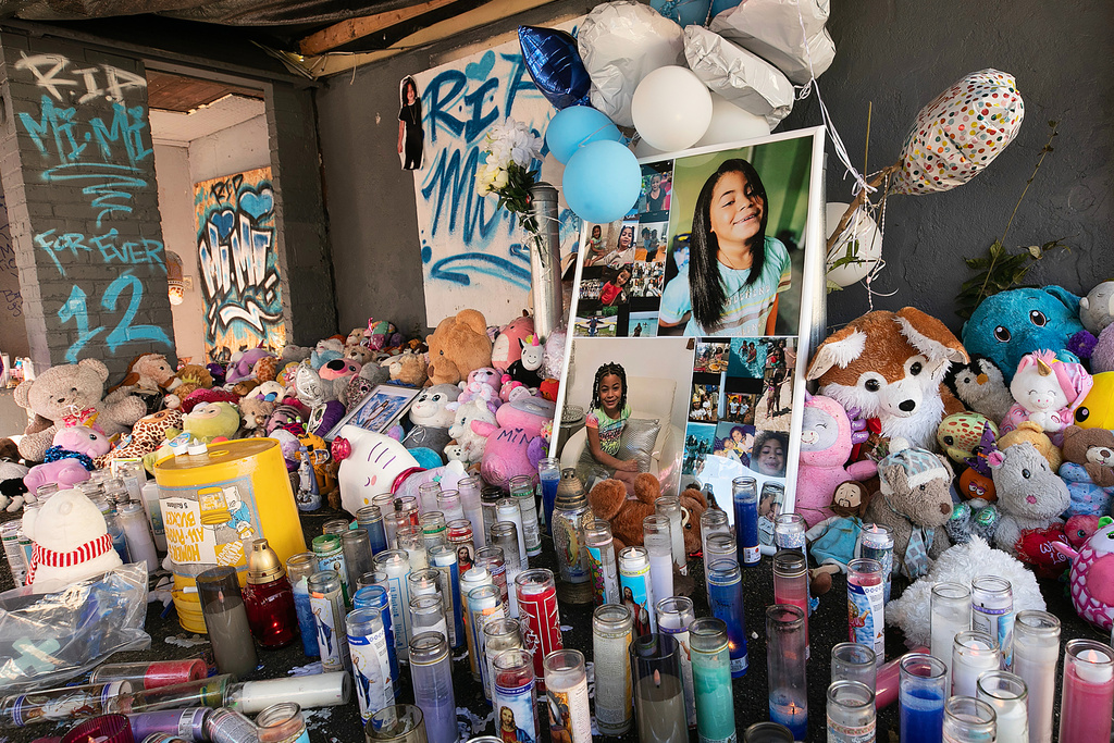 A memorial for Jacqueline "Mimi" Torres-Garcia, whose remains were found wrapped in plastic bags and bedding inside a plastic bin last month stands front of 80 Clark St., Thursday, Oct. 16, 2025, in New Britain, Conn. (Dave Zajac/Hearst Connecticut Media via AP)