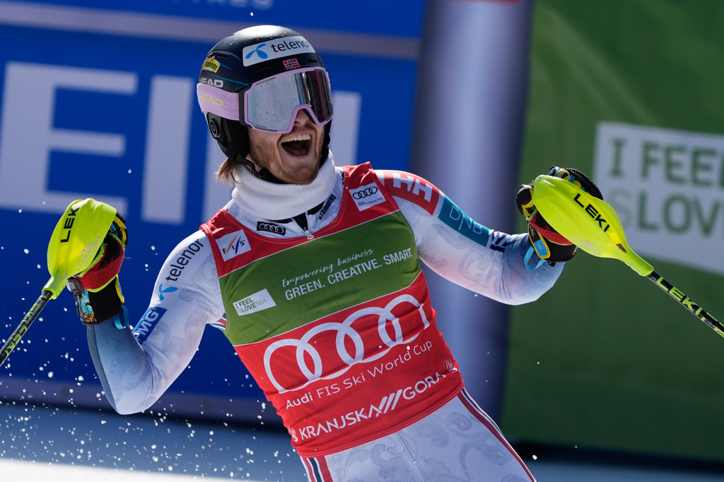 Norway's Atle Lie McGrath celebrates winning an alpine ski, men's World Cup slalom, in Kranjska Gora, Slovenia, Sunday, March 8, 2026. (AP Photo/Giovanni Auletta)