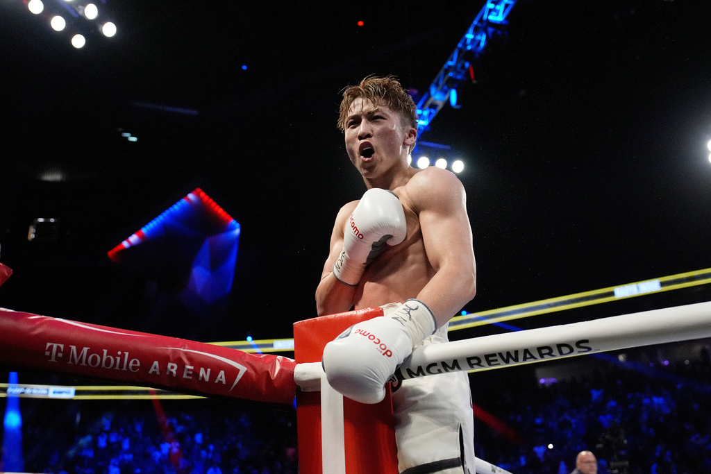 FILE - Naoya Inoue celebrates after defeating Ramon Cardenas in a junior featherweight title boxing match Sunday, May 4, 2025, in Las Vegas. (AP Photo/John Locher, File)